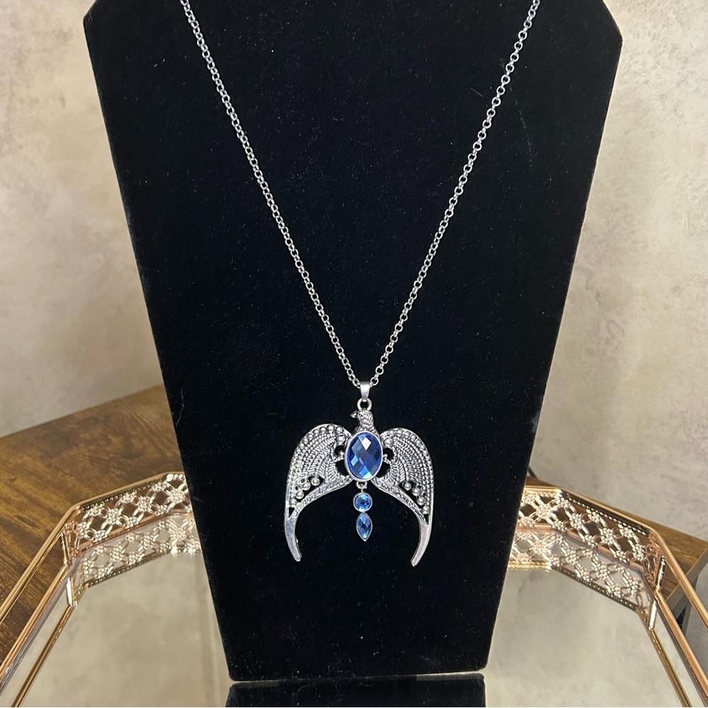 Elegant Silver Tone Bird Necklace with Blue Accents